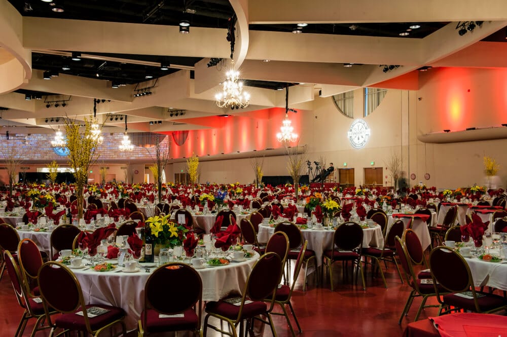 A closer view of Monona Terrace Exhibition Hall with round tables