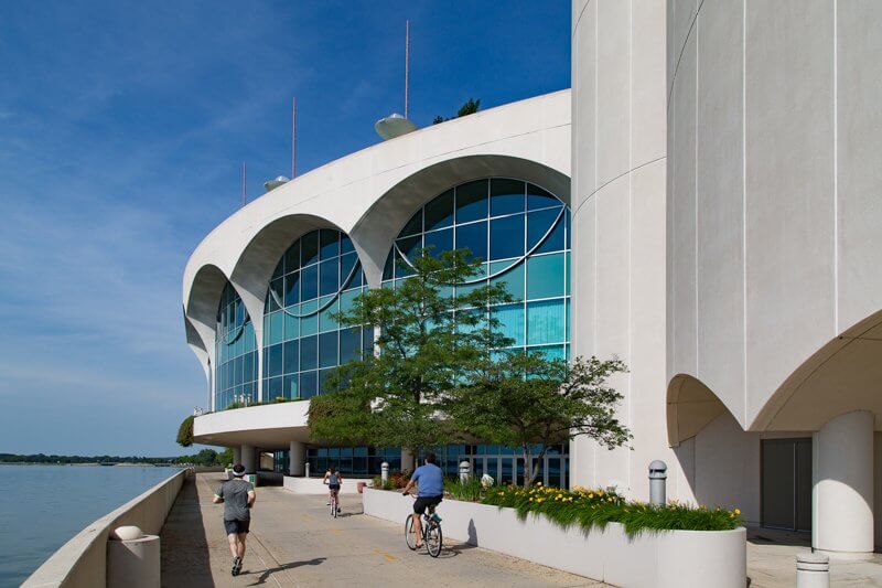 Monona Terrace side pathway with people jogging and riding their bikes