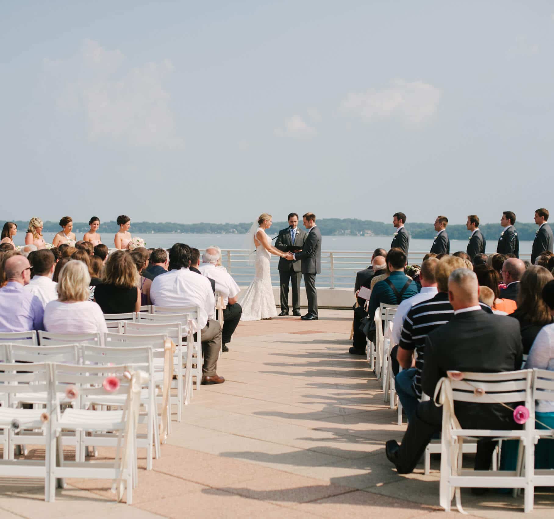 A couple getting married with the lake in the background